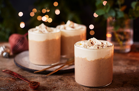 For an easy Christmas dessert idea that's packed with festive flavour, try this individual gingerbread latte puddings recipe. A rich and creamy spiced custard gets a boost from gingerbread liqueur, topped with soft whipped cream.
