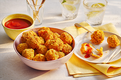 Easy, quick and super cheesy, these air-fryer mozzarella balls are perfect for sport snacking. With a crispy coating of chilli tortilla chips and a spicy sriracha and tomato dipping sauce, these are the ultimate game-day snack.