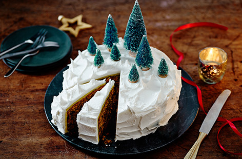 Looking for the best Christmas cake recipe? Get your festive bake on with this traditional Christmas cake recipe, featuring a rich fruit and nut cake, marzipan layer and snow-effect icing. This makes a fabulous festive centrepiece on Christmas Day or any gathering, or treat yourself to a slice after some Christmas sales shopping! Find out how to bake Christmas cake with our easy-to-follow recipe and cook's tips.