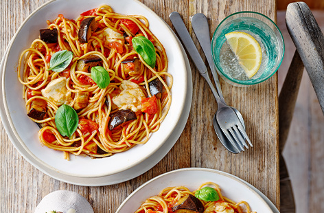 Soft chunks of aubergine are mixed through silky spaghetti and finished with torn mozzarella and freshly picked basil leaves.