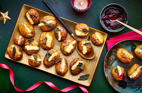 It's always nice to have some hot food to serve at a party and these cheesy baby potatoes are so tasty and easy, not to mention affordable if you're feeding a crowd. Offer with a tangy, citrussy cranberry sauce for dipping.