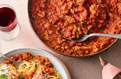 As well as saving money, we want what we eat to have a positive impact on our health and the planet. This Bolognese uses less meat and the budget-friendly root vet lends sweetness to the sauce.