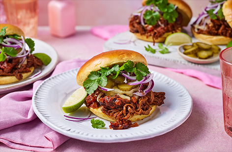 These birria-inspired buns are mouthwateringly delicious. Slow-cook your beef brisket with herbs and stock until tender, then shred it into the umami sauce. Serve in buns with pickles, mozzarella and coriander...now that's sure to impress. 