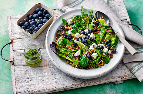 A fresh, light salad bursting with flavour from sweet blueberries, tangy feta cheese and nutty chickpeas and grains.