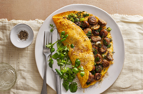 Browning the butter before cooking your eggs helps give this omelette a rich, nutty flavour that helps bring the earthy ingredients to life