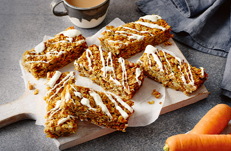 If you're partial to a flapjack, you'll love this carrot cake-inspired recipe, packed with rolled oats, carrots and walnuts for crunch, then finished with a citrussy cream cheese drizzle. Super-easy for even beginner bakers to make, this teatime treat makes a great on-the-go snack too.