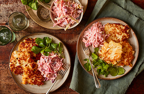 Channel a comfort food classic into a quick midweek meal with this cauliflower cheese fritters recipe. Using a jar of rich cheese sauce for a super speedy hack, these crisp golden fritters are the perfect veggie dinner.