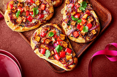 Load shop bought naan breads with spicy paneer and peppers for a delicious Diwali snack. These would also be great for a quick lunchtime fix or midweek dinner idea.
