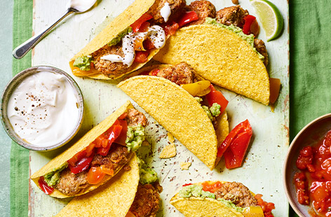 A tasty Mexican-inspired dish with chicken mince meatballs and all the taco toppings