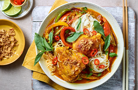 Juicy chicken thighs cooked in fragrant Thai-inspired spices and served with noodles is comfort in a bowl that's ideal for brightening up a grey winter's day. The herbs and spices give a real depth of flavour, but the recipe is easy to follow, even for novice cooks.
