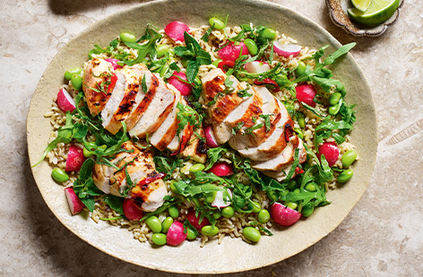 Grain bowls are a lunchtime staple – the more colourful the better! This recipe uses microwavable rice and frozen edamame to make it extra easy.