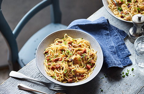 Whip up this quick chorizo and courgette spaghetti recipe and have dinner on the table in under half an hour. Toss spaghetti with crispy chunks of chorizo, a rich garlic butter sauce and fresh grated courgette for a new go-to pasta. 