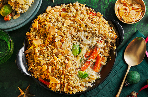 Use leftover veg from your Christmas dinner to make this epic savoury crumble. This vegan bake makes a great Boxing Day dinner and is loaded with sage and onion stuffing for the crumble topping.