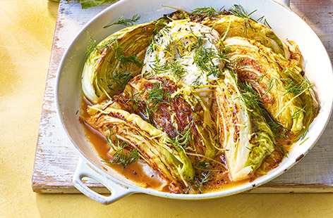 Sweetheart cabbage wedges are gently braised in cider and butter, before being roasted until tender. Top with a dollop of crème fraîche for a delicious side that tastes great alongside grilled meat.