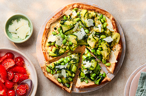 This pretty galette is a feast for the eyes as well as being totally delicious! Brimming with fresh spring flavours, it's simple to make using readymade pastry and the herby, lemony courgettes and soya beans pair beautifully with the creamy ricotta. What's more, you'll have leftover marinated courgette mix for our pasta salad – see recipe, below.