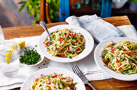 This easy crab linguine recipe is an Italian classic that comes together in minutes. Tinned crab is tossed with garlic, chilli, parsley and lemon for a light summer pasta dish ready in just 15 minutes.
