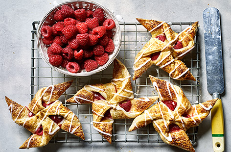 Classic Danish pastries get a new spin with summer raspberries and creamy custard for a quick-to-make treat worth trying
