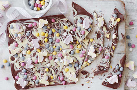 Made with swirls of milk and white chocolate and topped with pastel-coloured chocolate eggs and mini mallow bunnies and chicks, this Easter egg bark makes a lovely edible gift or indulgent snack
