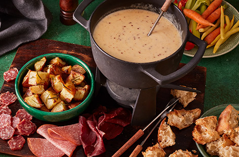 Gather everyone round the table and tuck into this gooey, indulgent cheese fondue