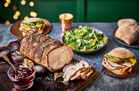 This roast pork and seasonal orange salad will make a great sharing centrepiece at your next festive party