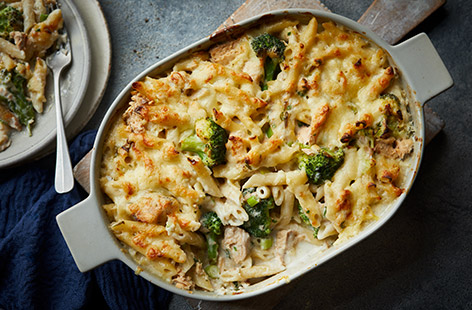 Transform family favourite fish pie into a simple pasta bake that can be prepped in advance. With tinned salmon and tuna in a creamy sauce (plus lots of melted cheese on top), both you and the kids will love this one. 