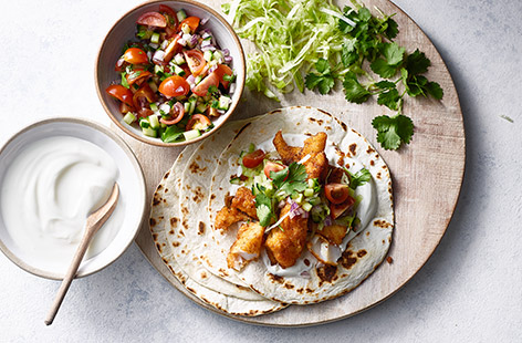 Upgrade your weekly taco night with this light yet punchy harissa and fish combo, with the welcome addition of a crisp, refreshing veg salsa