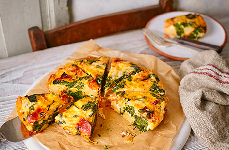 Make a box of eggs the basis of your dinner with this wallet-friendly chorizo and spinach frittata recipe. Filled with tender potatoes and spicy chorizo and topped with melting cheese, this 30 minute meal is an easy recipe for lunch or dinner. 