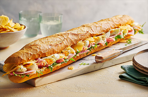 Ham, egg and crisps... yep, your read that right! This giant sharing baguette is packed full with perfectly boiled eggs, Wiltshire cured ham and salt and vinegar crisps for crunch - you can swap in your favourite crisp flavour, if you like. Cut it into fours and share on your next picnic!