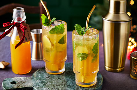 We’ve added a festive twist to a classic Mojito recipe with the addition of fresh ginger and a homemade spiced orange and honey syrup.