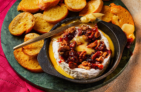 This easy air-fryer brie is a must-try for entertaining. Top the cheese with fruity chutney for a gorgeous caramelised glaze and walnut pieces for extra crunch, then dip in! Cooking for a crowd? Simple double the recipe and cook both at the same time.