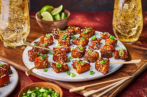 These bite-sized cubes of pork belly are coated in a sticky glaze of lime, sesame seeds and soy sauce