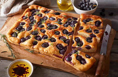 This gorgeous focaccia is studded with juicy black grapes, which add a pop of colour and bags of flavour
