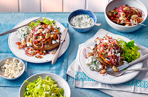 Swap a plain jacket potato for this healthy Greek-inspired stuffed sweet potato recipe instead. Fill your potato with a colourful butter bean, feta, tomato and red onion salad and finish with a dollop of homemade tzatziki for an easy healthy dinner idea.