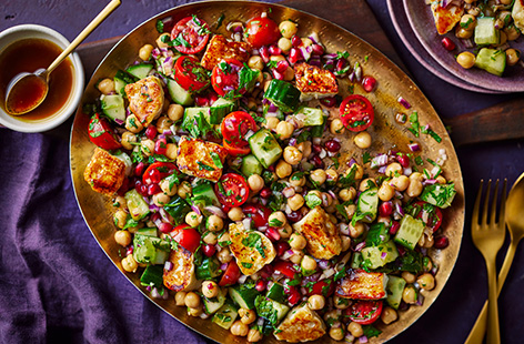 Zainab Pirzada's citrussy salad is super simple to serve up for Iftar. It has all the flavours of a Kachumber salad with crispy halloumi and chickpeas for protein (and crunch!) Finish with a drizzle of sweet and zesty pomegranate molasses dressing.
