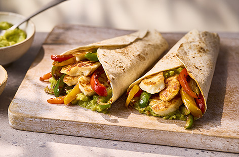 Rustle up a super-easy midweek meal with these effortless halloumi fajitas, made with shop-bought seasoning and ready-made guacamole.