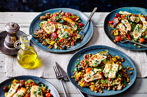 For a hearty vegetarian dinner idea, try this halloumi and vegetable traybake recipe. This easy one-dish recipe combines creamy green lentils, caramelised Mediterranean veg and melting cheese for a simple speedy meal.