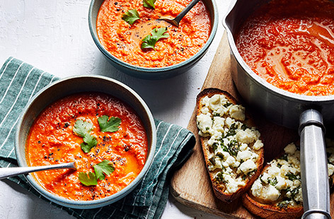 Nothing can beat a bowl of comforting tomato soup on a cold day and our quick and easy recipe includes some harissa paste for a spicy kick. Add the creamy feta toasts and you have a complete meal that's warming and satisfying at any time of day.