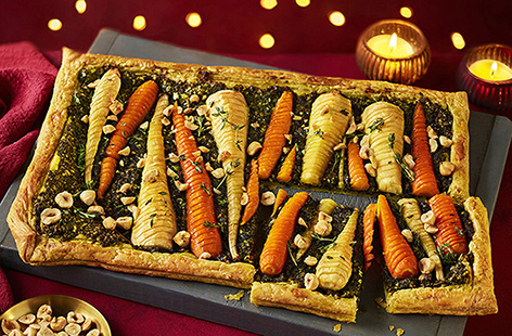Transform your roast parsnips and carrots into a show-stopping centrepiece with this impressive puff pastry vegetable tart. This is the perfect veggie main for Christmas dinner or any festive occasion.