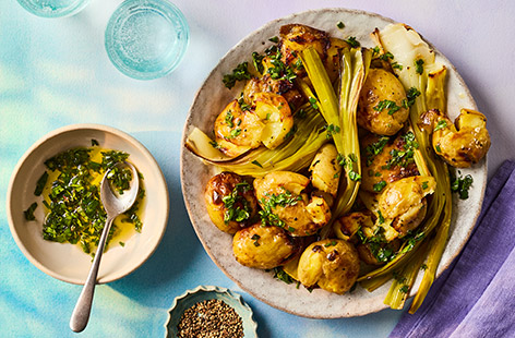 These roast potatoes are a celebration of spring. With a trio of fresh herbs and seasonal leeks, this dish is fresh, fragrant and vibrant. Crushed potatoes are such an easy way to serve roast spuds, yet look cheffy, ideal for Easter entertaining or just a nice Sunday roast. Cooked in olive oil, this recipe is low in saturated fat and a source of fibre too!