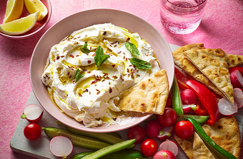 Middle Eastern soft cheese, labneh is actually strained yogurt and while it looks cheffy, it's super-easy to make, you just need a little patience. Made from Greek-style yogurt strained overnight, you just need to add the final flourishes the next day, then serve with crudités and flatbreads. This is going to impress without a doubt!