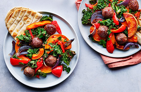 Take ready-made turkey meatballs and create two delicious dinners. This simple, healthy traybake is packed with veg and super-tasty, then use the remaining meatballs for a tagine later in the week.