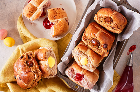 Have some fun with your hot cross buns and turn them into these indulgent hot cross bun doughnuts. A super simple Easter hack just choose your favourite flavour of hot cross buns and take your pick of fillings, from indulgent chocolate to sweet jam.
