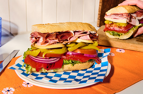 These massive layered Italian deli sandwiches are super-popular on social media. They look incredible when the cross-section reveals the distinct layers of meat, salad, cheese and veggies. Perfect for a lunch treat or to pack on a picnic!