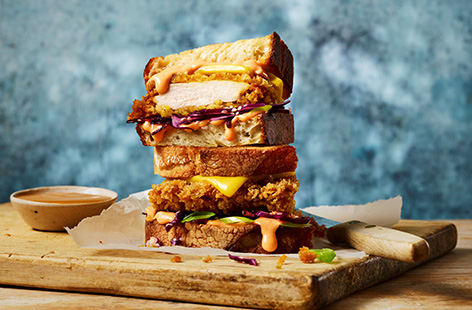 For an indulgent lunch for two, why not try this Katsu sando-inspired toastie? There's golden breaded chicken, katsu sauce, melted cheese, spicy mayo and crunchy red cabbage - everything you need for the ultimate posh toasted sandwich.