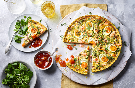 Our gently spiced salmon tart recipe, made with peas and fresh dill, is a feast for all the senses 