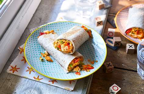 Make a batch of this breakfast burritos and store in the freezer for a make ahead breakfast that makes mornings easy. Wholemeal tortillas are loaded with scrambled egg, peppers, cheese and sweet potato for a healthy kids breakfast idea.