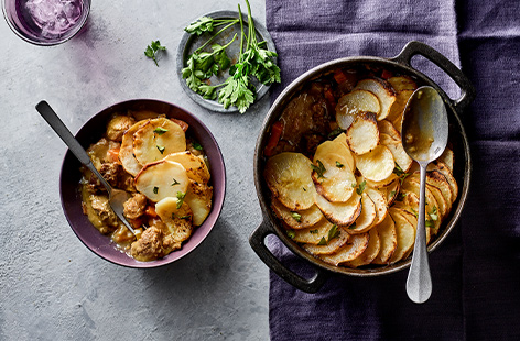 This hearty lamb hotpot is gently spiced with mace, star anise and cinnamon, giving it a lovely warming flavour. Serve it up for a comforting Sunday dinner.