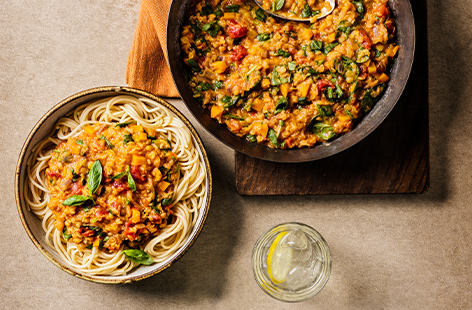 Packed with nutritious lentils and Vitamin C-rich carrots, this vegan version of spaghetti bolognese is on the table in just over half an hour