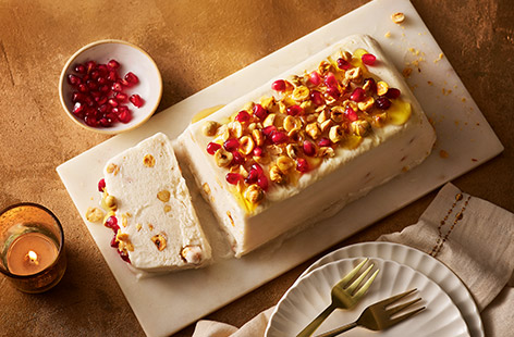 Translated as 'half-frozen', Italian semifreddo has a distinctive frozen mousse-like texture, which makes a wonderfully indulgent Christmas dessert. This vegan-friendly version is made with just a handful of ingredients and is ideal for making ahead – just remove from the freezer 15 minutes before decorating and serving.