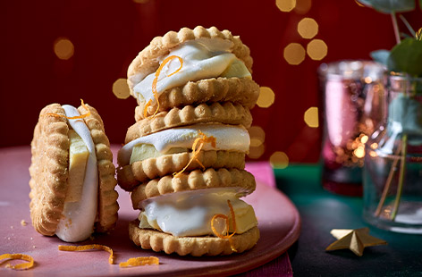 It's hard to improve upon melted marshmallows sandwiched between biscuits, but we've tried with our festive edition of s'mores. We've added white chocolate and citrus and used shorties biscuits for a buttery, crumbly taste. A top treat for Christmas tele that's ready in 10!
